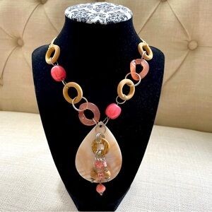 Elegant Coral and gold colored beaded seashell necklace